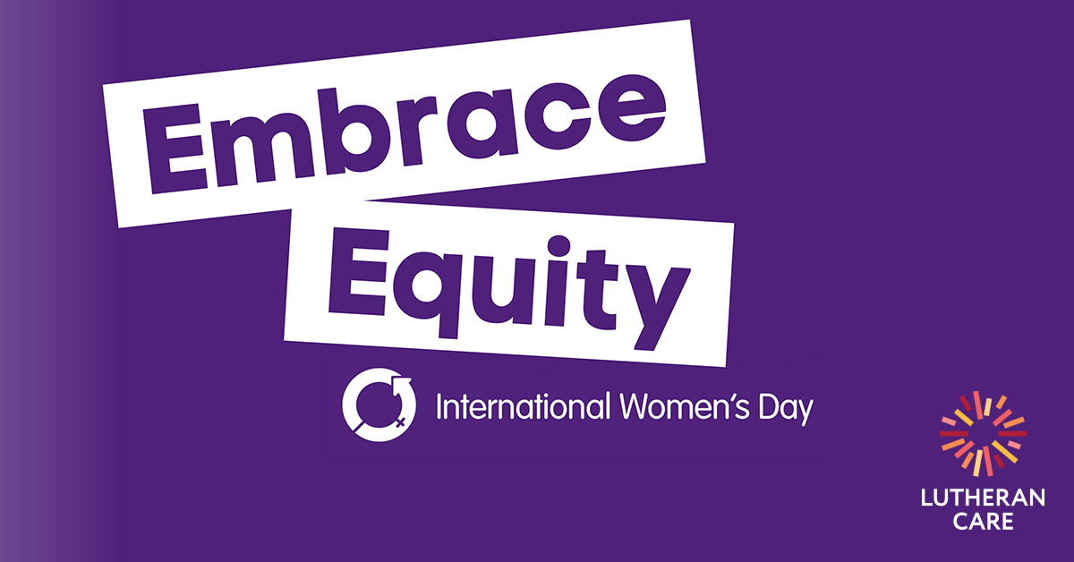 Image says embrace equity International Women's Day in white writing against a purple background. The Lutheran Care logo appears in the bottom right hand corner.