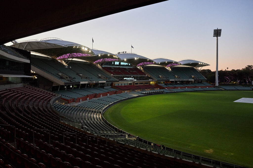 A view of the sun going down over Adelaide Oval.