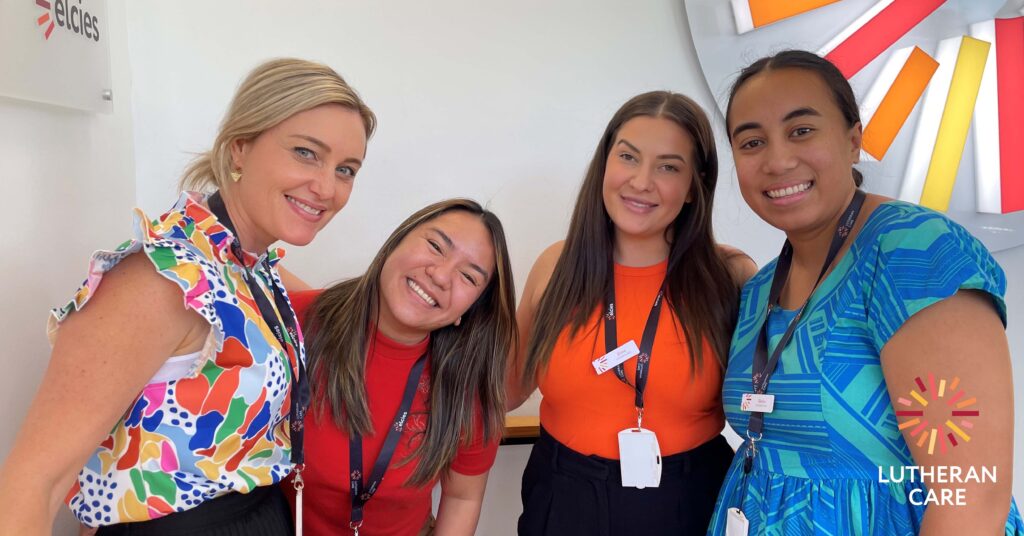 Lutheran Care Staff Members on Harmony Day. The Lutheran Care logo appears in the bottom right hand corner.