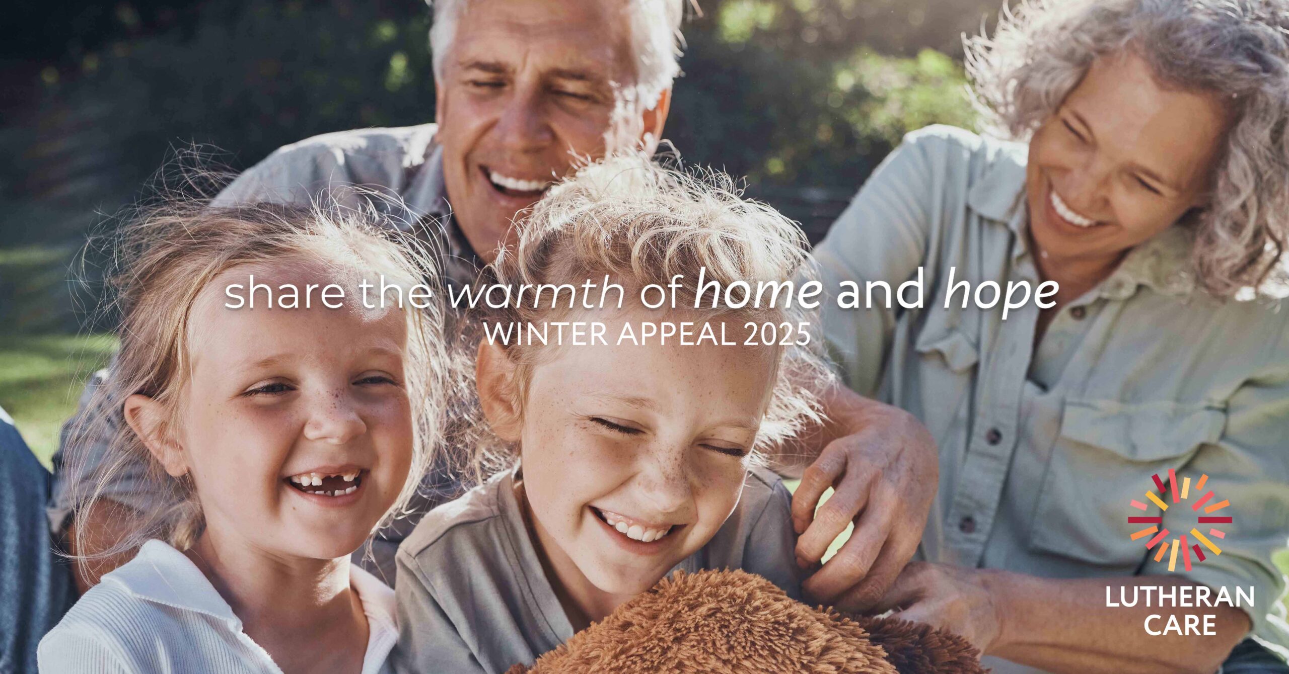 Grandparents and their two grandchildren in the park laughing together. Text reads share the warmth of home and hope Winter Appeal 2025. The Lutheran Care logo appears in the bottom right hand corner.