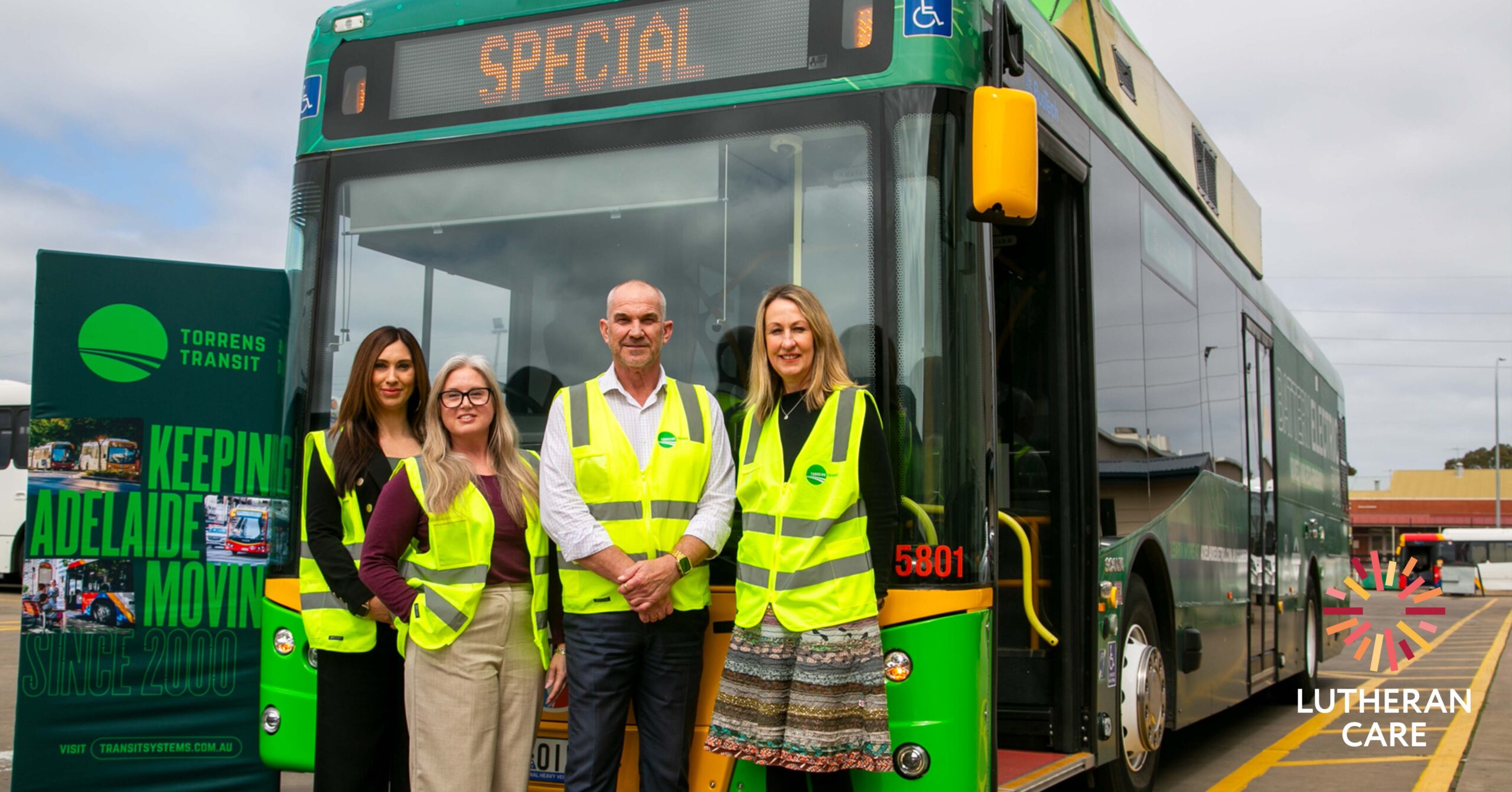 Torrens Transit and Lutheran Care Head of Public Relations Katrina Ranford in front of a bus. The Lutheran Care logo appears in the bottom right hand corner.