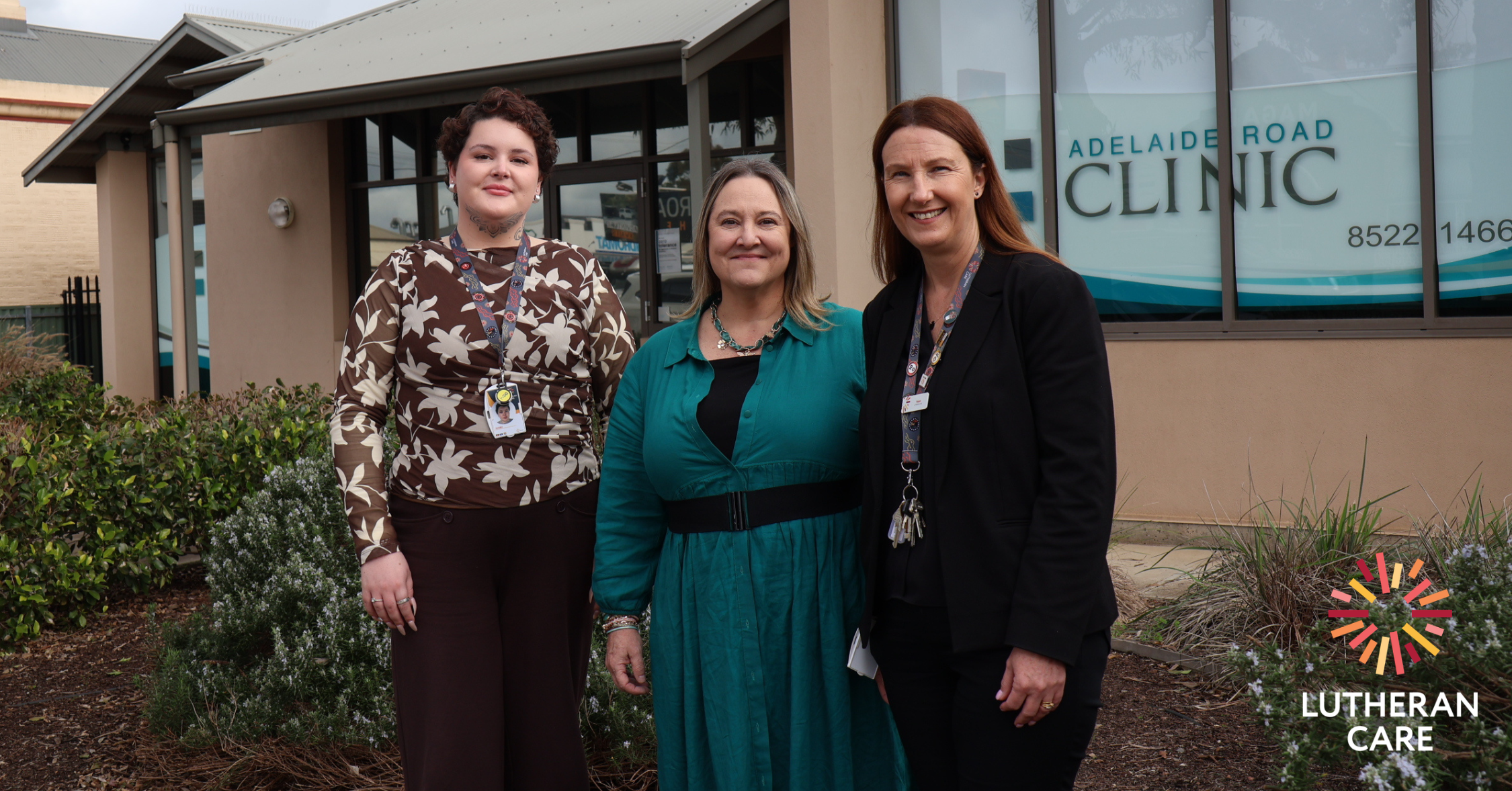 Image of SPP team outside of the Adelaide Road Clinic. The Lutheran Care logo appears in the lower right hand corner.
